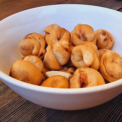 Жареные с говядиной в Пельмэн по цене 390 ₽