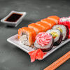 Логотип кафе Maiko Sushi Bar