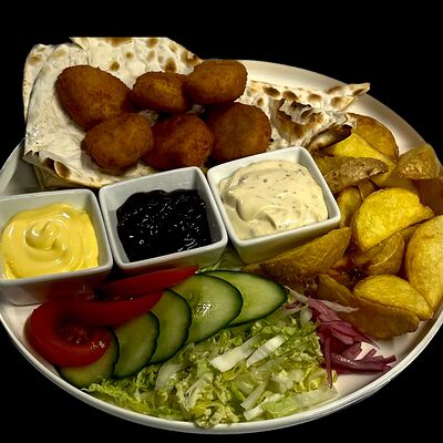 Тарелка с наггетсами в Пицца тот по цене 449 ₽