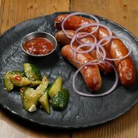 Ассорти колбас с аджикой и битыми огурцами в Brasserie Kriek