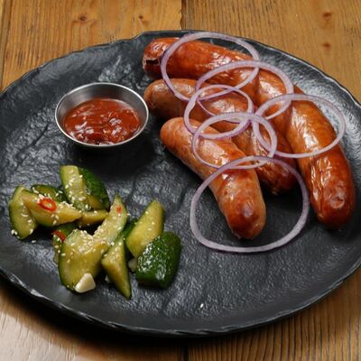 Ассорти колбас с аджикой и битыми огурцами в Brasserie Kriek по цене 1590 ₽