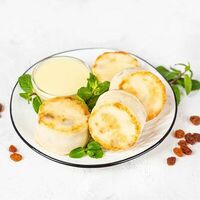 Сырники с изюмом и сгущенным молоком в У Палыча. С пылу, с жару!