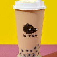 Черный латте с шариками тапиоки в M-Tea
