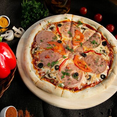 Пицца с ветчиной в Pizza Milano по цене 850 ₽