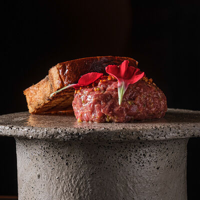 Тартар из говядины, икра летучей рыбы в KOJI по цене 1330 ₽