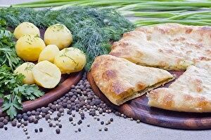 Осетинский пирог с картофелем и зеленью в Осетинские пироги от Забавы по цене 1200 ₽