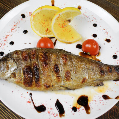 Форель радужная на мангале в Гриль хаус по цене 460 ₽