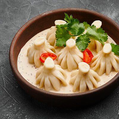 Мини-хинкали из телятины в сливочно-горчичном соусе в Гранат по цене 360