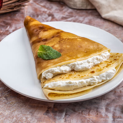 Блин Творожный в Матрешка по цене 99 ₽