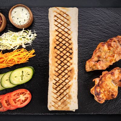 Шаурма острая с курицей L в Shawarmahouse по цене 590 ₽