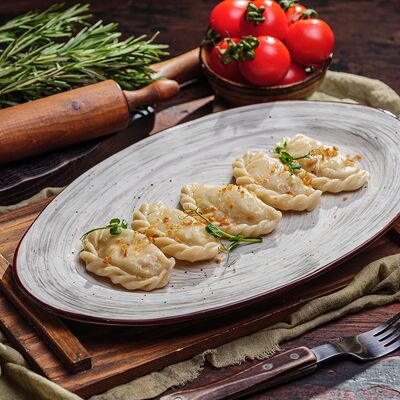 Вареники с картофелем в Пельмения по цене 483 ₽