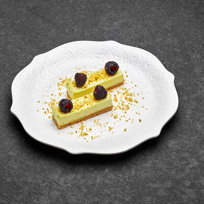 Фисташковый чизкейк с малиновым мармеладом в Залечь на дно в Гамбург по цене 568 ₽