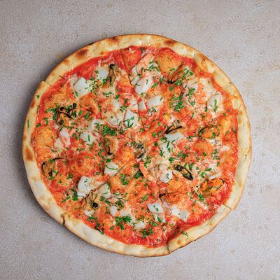 Пицца Фрутти ди Маре с сыром в Bocconcino по цене 1930 ₽