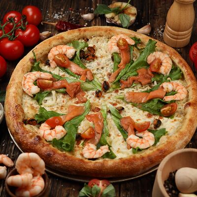 Пицца с морепродуктами в KIRIMATI по цене 1199 ₽