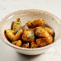 Молодой картофель с травами в Cheeseria