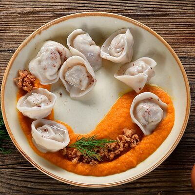 Пельмени свинина/телятина на подушке из тыквенного пюре в Колхида Palace по цене 435