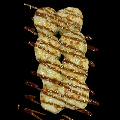 Запеченный ролл Тортилья в Kaikan по цене 585 ₽