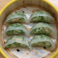 Dim Sum Креветка и шпинат (xanh la) в Dim sum квинтэссенция азиатской кухни