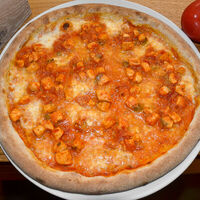 Пицца Лосось с томатами в Кастельсардо