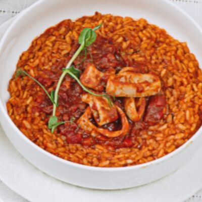 Ризотто с кальмаром и овощной сальсой в Паста Фэмили по цене 790 ₽