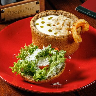 Чешский чесночный суп с копченым кальмаром в Моравия по цене 678 ₽