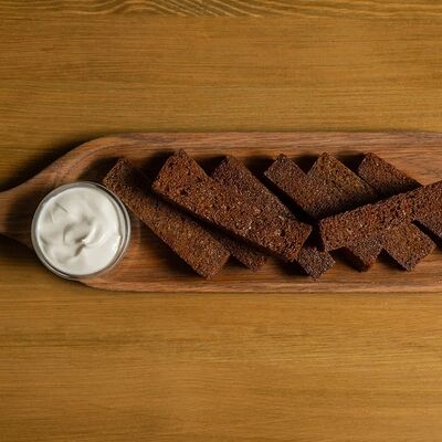 Гренки чесночные в Lil Brazil по цене 350 ₽