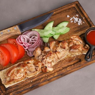 Шашлык из мякоти куриного бедрав Bizon Grill Pub по цене 821 ₽