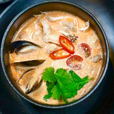 Суп том ям с морепродуктами в Ньокки по цене 690 ₽