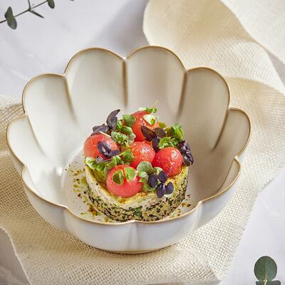 Печеные баклажаны с кускусом, киноа и томатами в Ribambelle по цене 750 ₽