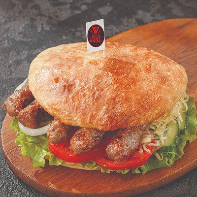 Бургер с чевапи в YGOSLAVIA GRILL по цене 590 ₽