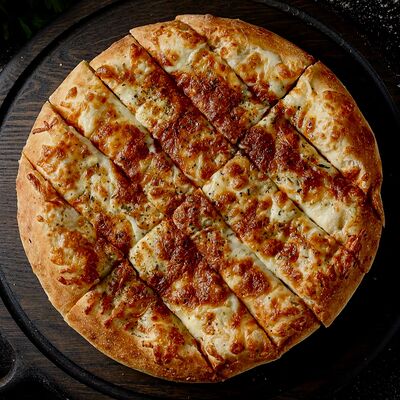 Сырные палочки с орегано (22 см) в Hot Pizza по цене 460 ₽