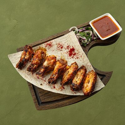 Куриные крылышки с соусом чили в Шашлычара по цене 490 ₽