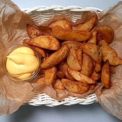 Картофель по-деревенски в Кафе-бар Лайт по цене 210 ₽