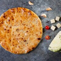 Осетинский пирог с тушеной капустой, осетинским сыром и орехами в Пирог-ОС
