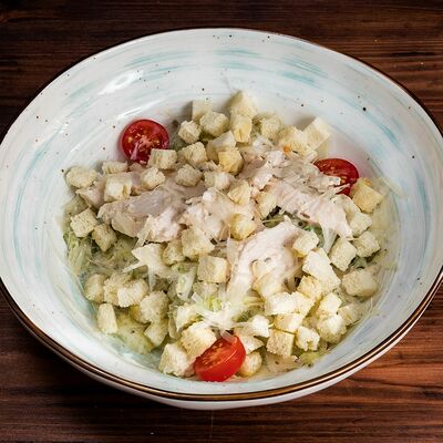 Салат Цезарь в Трактир Колесо по цене 390 ₽