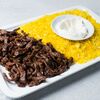 Шаурма говядина и рис на тарелке в Арабская кухня по цене 670