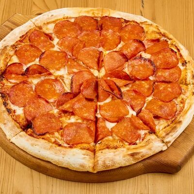 Пицца Супер пепперони в 4 сыра по цене 860 ₽