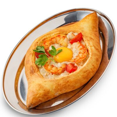 Хачапури по-аджарски с креветками в Старик Хинкалыч по цене 650 ₽
