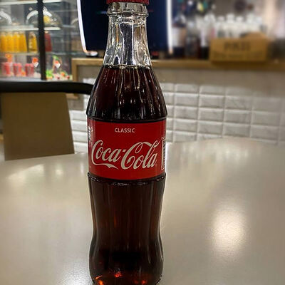 Coca-Cola в стеклянной бутылке в Пиццерия Фетучини по цене 370 ₽