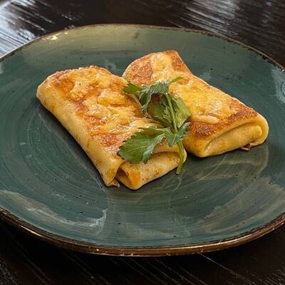 Блинчатые пирожки с филе птицы, шампиньонами и сливками в Длинный нос по цене 340 ₽