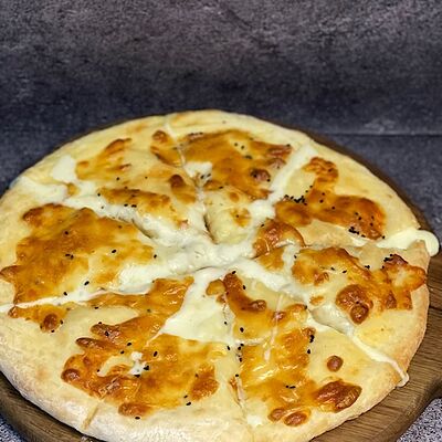 Хачапури по-мегрельски в Buta по цене 580 ₽