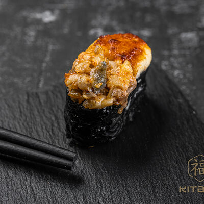 Гункан угорь запеченный в Kitana по цене 216 ₽