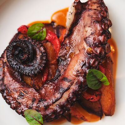 Осьминог с бататом и печеным перцем в The Odi по цене 82 р.