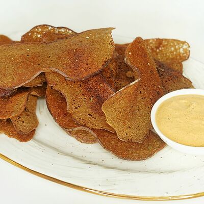 Ржаные чипсы с острым соусом в Бар Пиф-Паф по цене 230 ₽