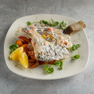 Камбала с картофелем и сливочным соусом в Мидийное место по цене 1290 ₽