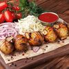 Картофель на мангале с курдюком в Мясо по цене 250