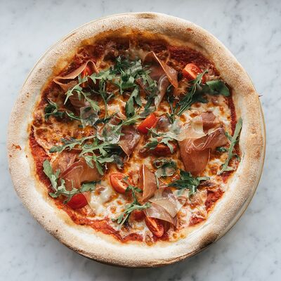 С пармой и рукколой в PIZZA by gastrobar ISKRA по цене 920 ₽