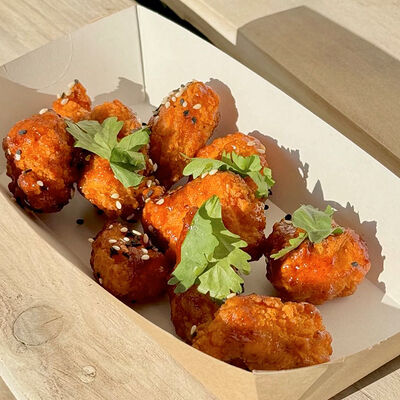 Чикен попкорн с сырным соусом в Культ Карго по цене 440 ₽