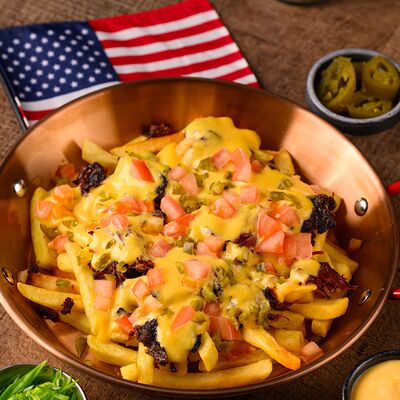 Заряженная картоха с копченой говядиной в American BBQ по цене 44 р.