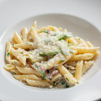 Пенне с пармской ветчиной и спаржей в Болоньетта